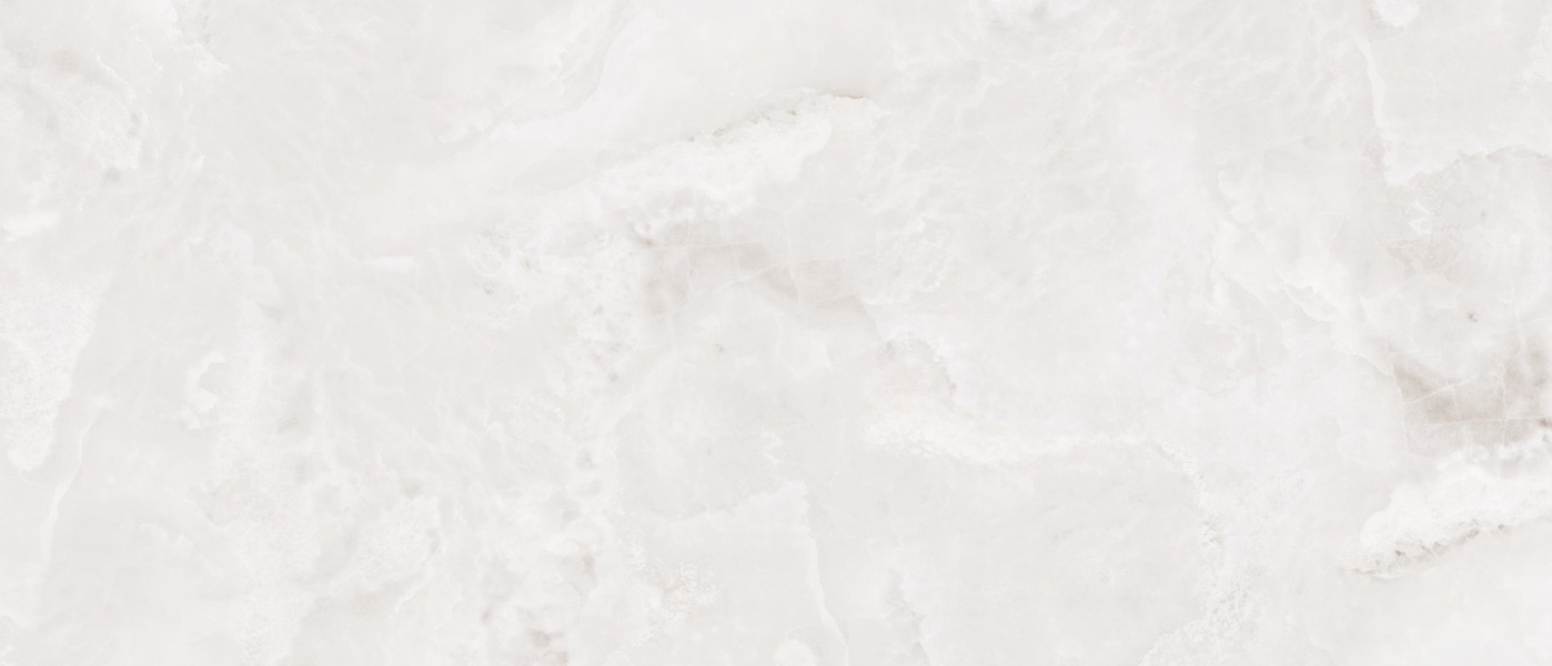 Cloudy Onyx Regal porcelain slab surface, a pale cream-grey ground with soft clouded movement