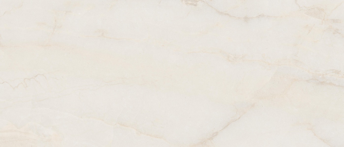 Ivory Onyx Stone porcelain slab surface, a warm ivory ground with faint beige-gold veining
