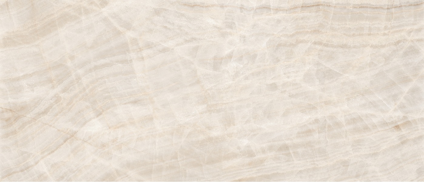 Taj Mahal Crema porcelain slab surface, a cream-white ground with soft clouded grey-gold veining