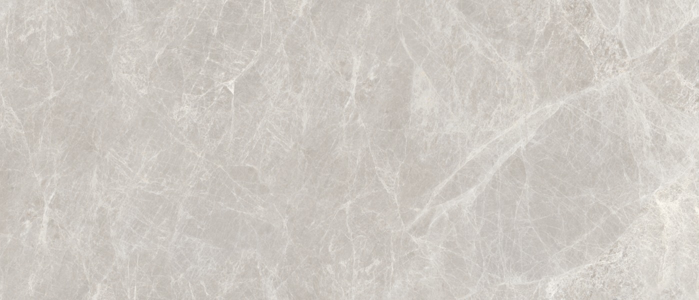 Taupe Emperador porcelain slab surface, a light grey-brown ground with fine mottled movement
